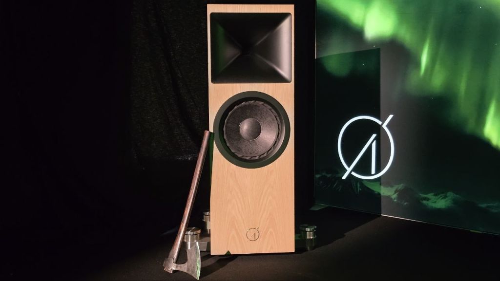 Ø Audio Q.V.S.T. horn-loaded loudspeaker in oak, with a Norwegian axe and aurora backdrop