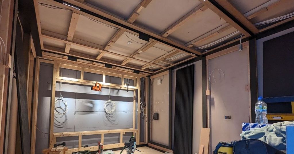 Home cinema screen wall framing during first fix, before the walls are boarded