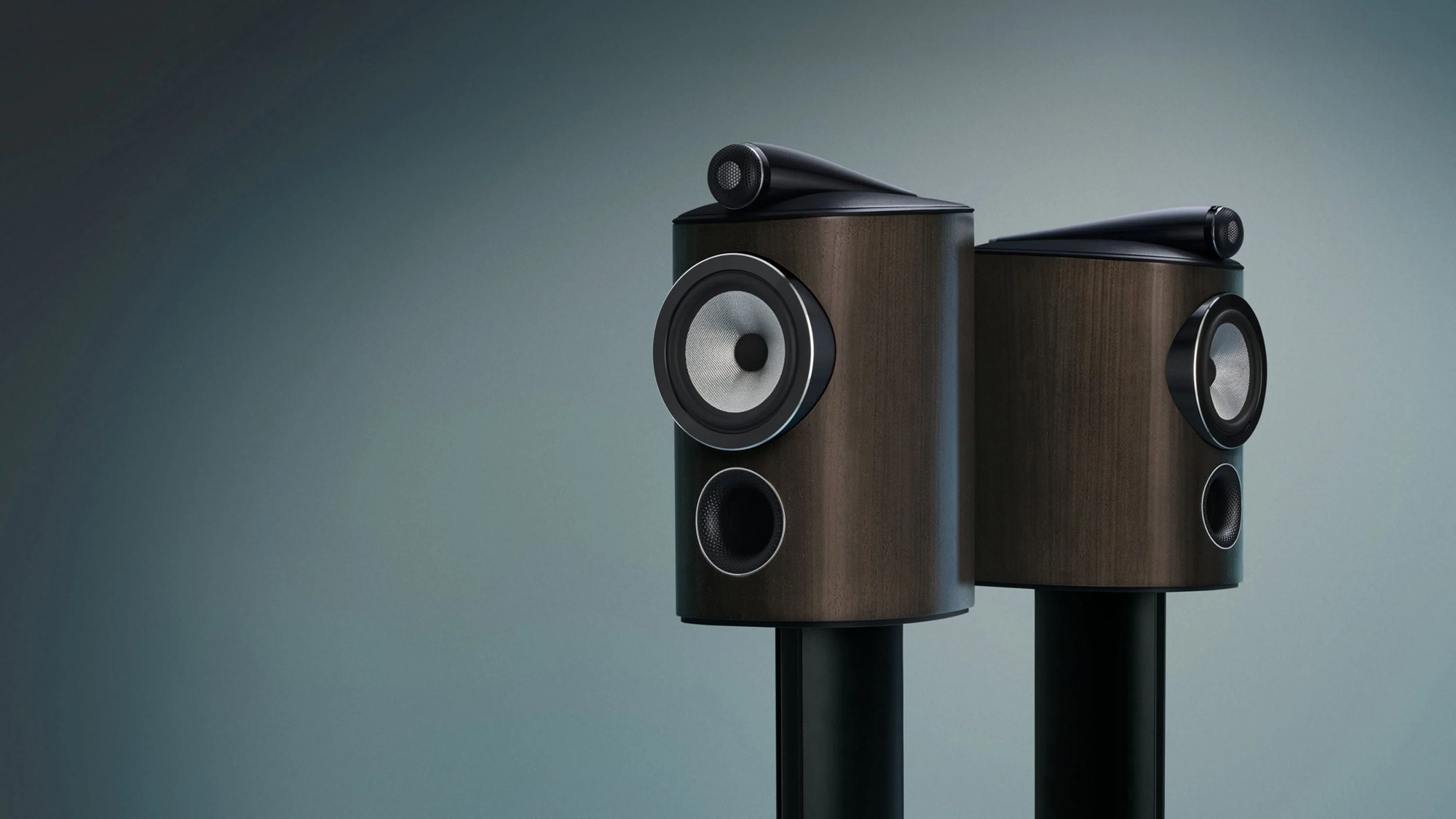A pair of Bowers & Wilkins 805 D5 speakers in a dark walnut finish on stands